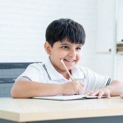 Boy Studying Smiling Cropped